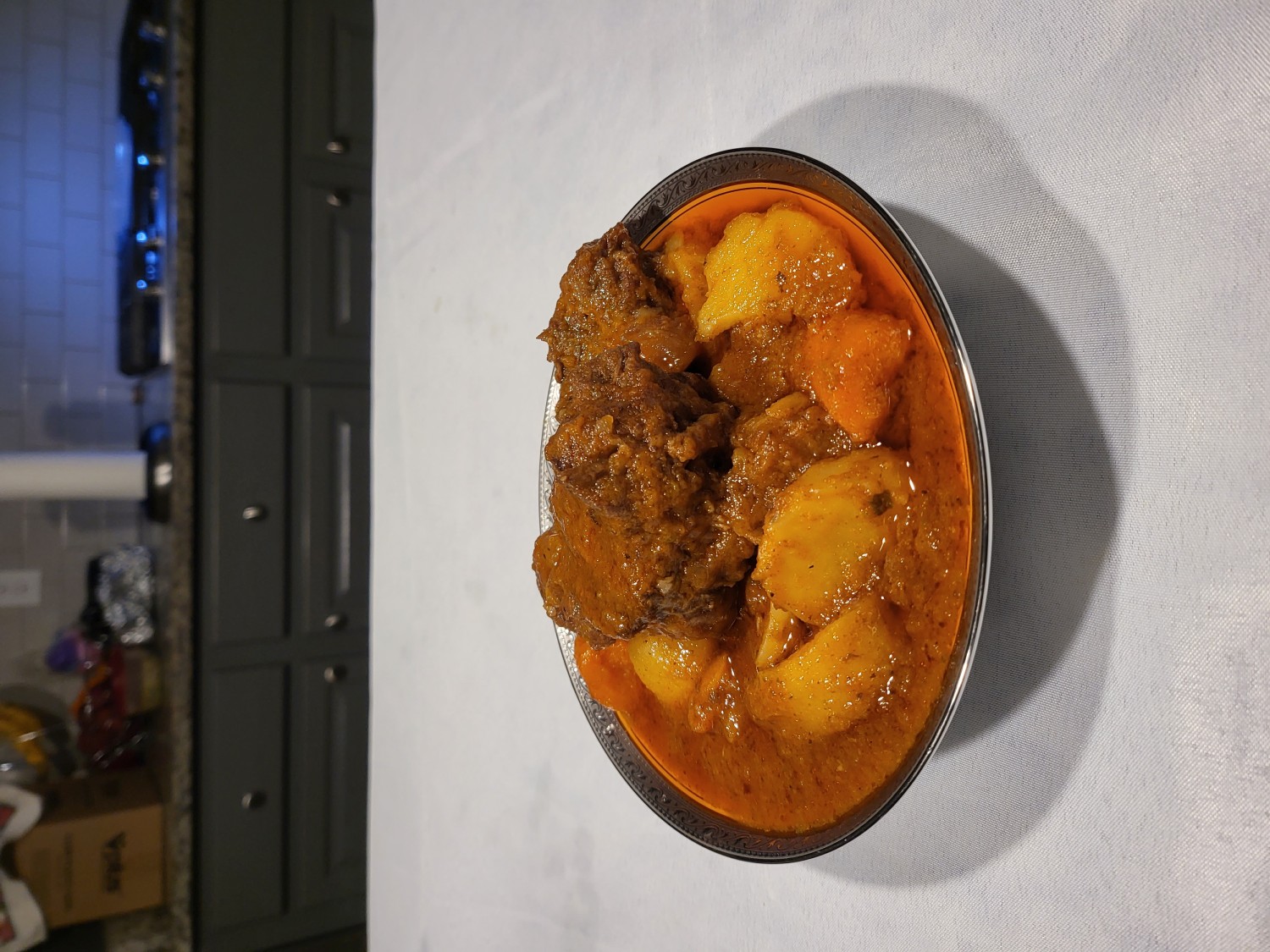 Fresh auxtail served with two pieces of bread